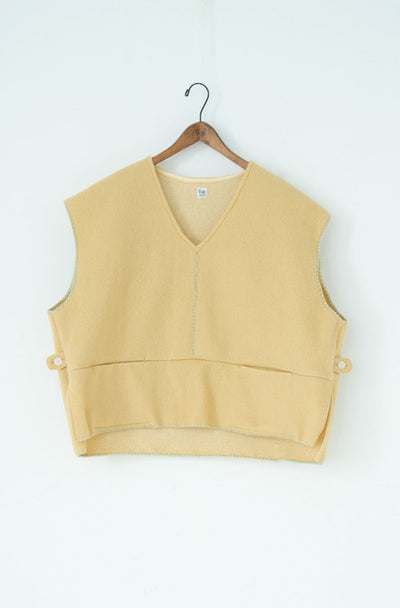 needle work over vest