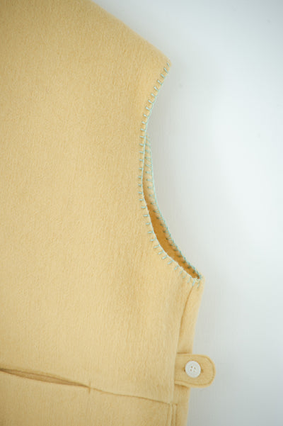 needle work over vest