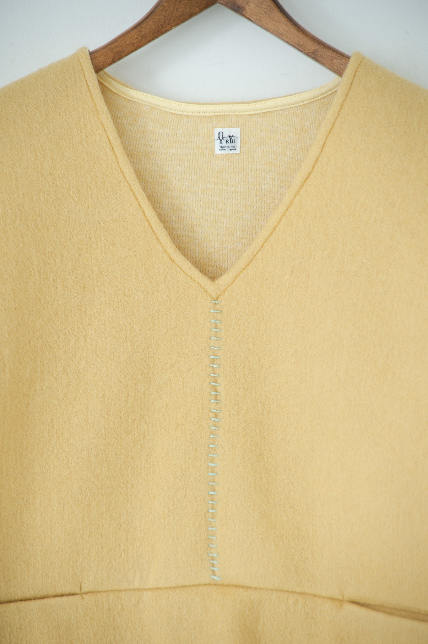 needle work over vest