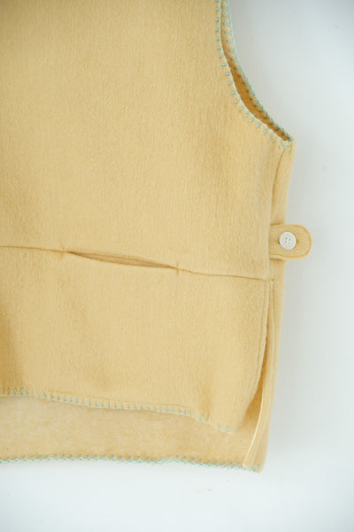 needle work over vest