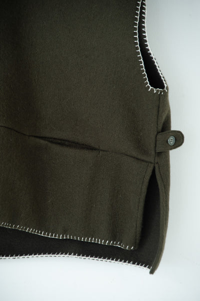 needle work over vest
