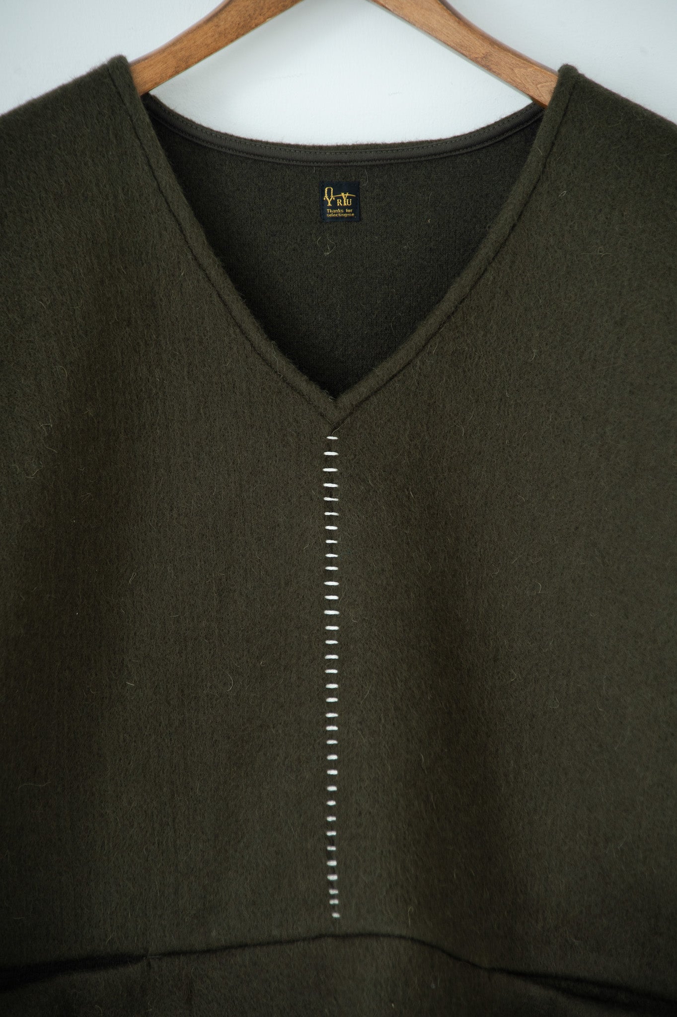 needle work over vest