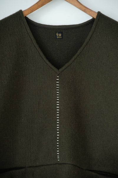 needle work over vest