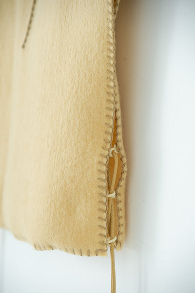 needle work tiny vest