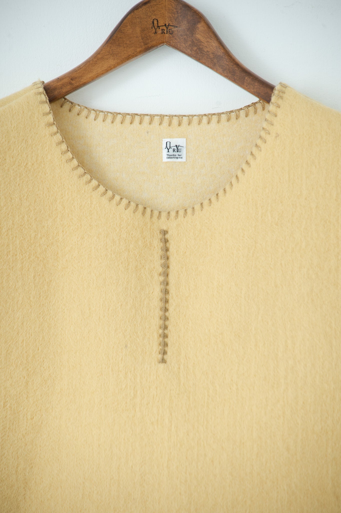 needle work tiny vest