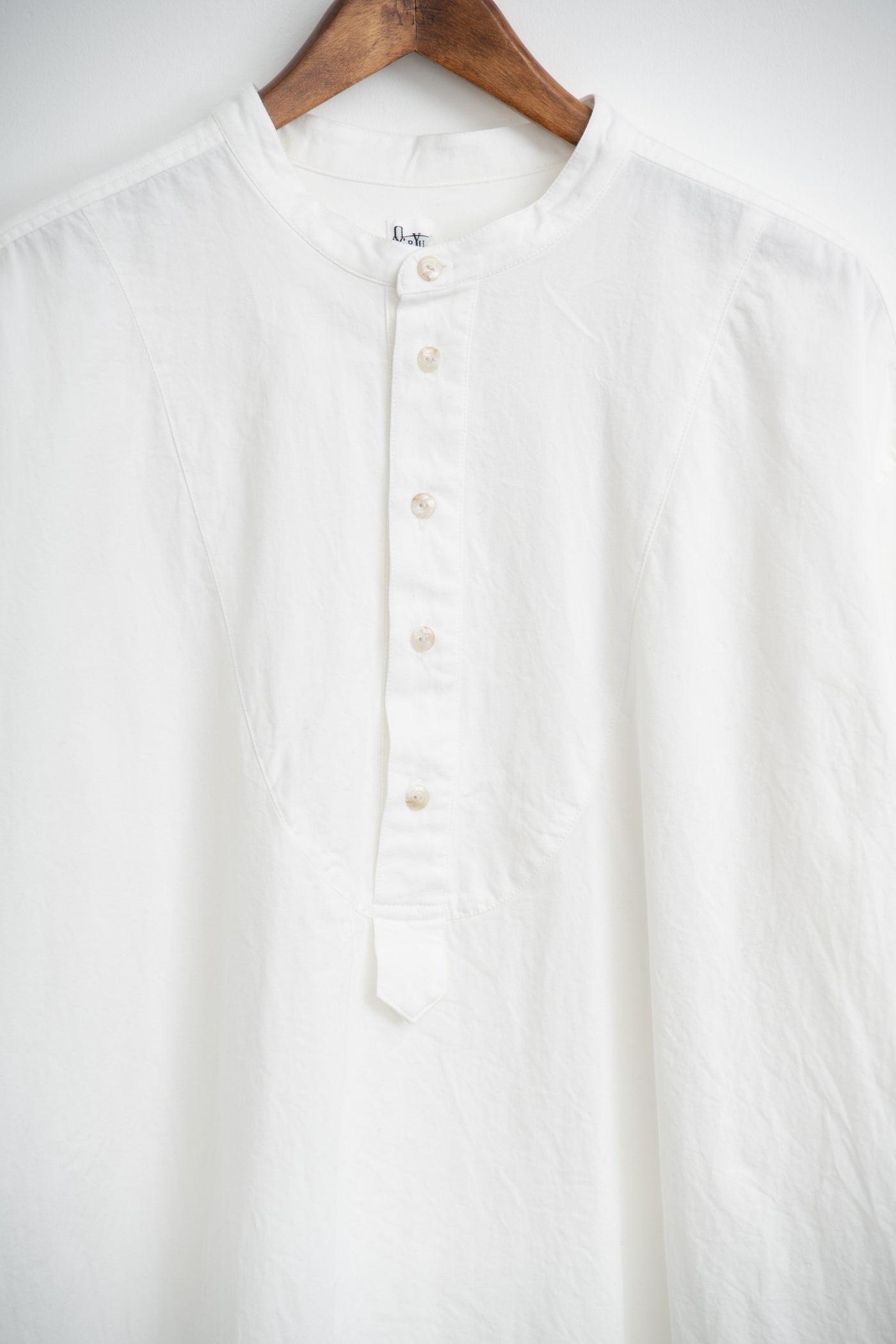 band collar over bosom shirt
