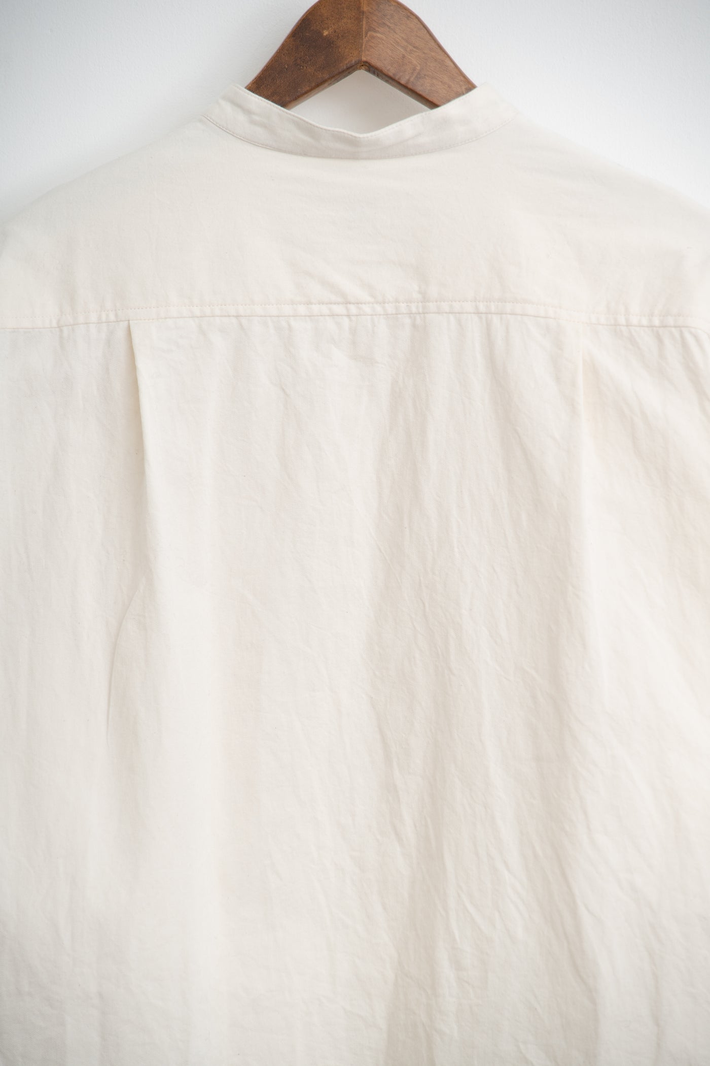 band collar over bosom shirt