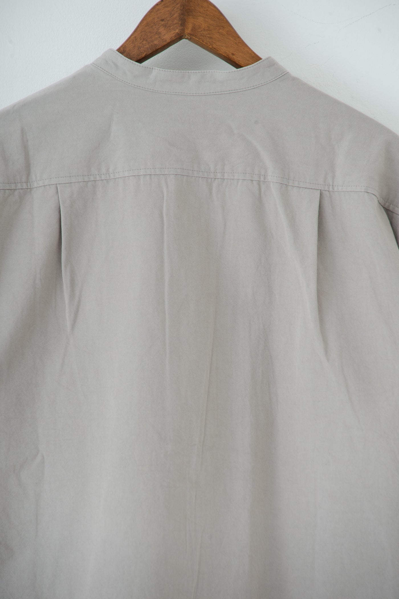 band collar over bosom shirt