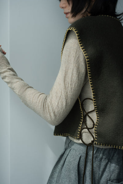 needle work tiny vest