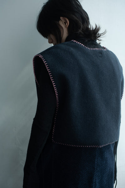 needle work tiny vest