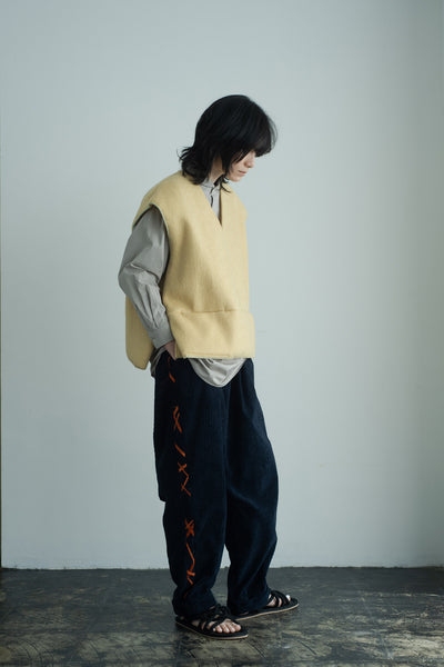 needle work over vest
