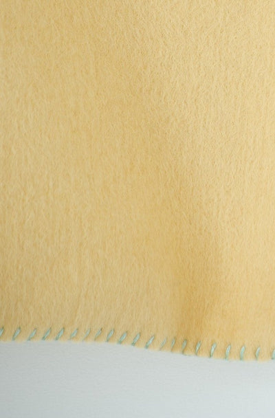 needle work over vest