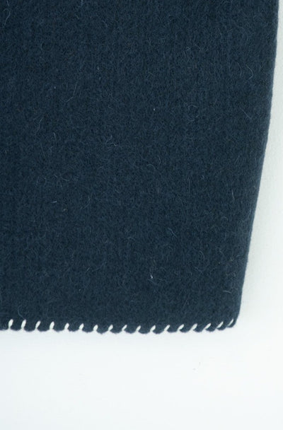 needle work over vest