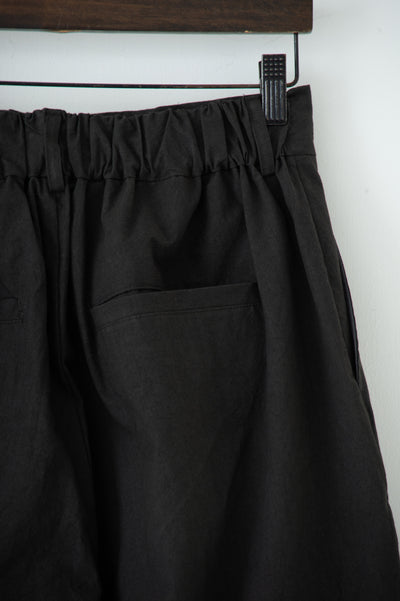 dump two-tuck slacks with belt